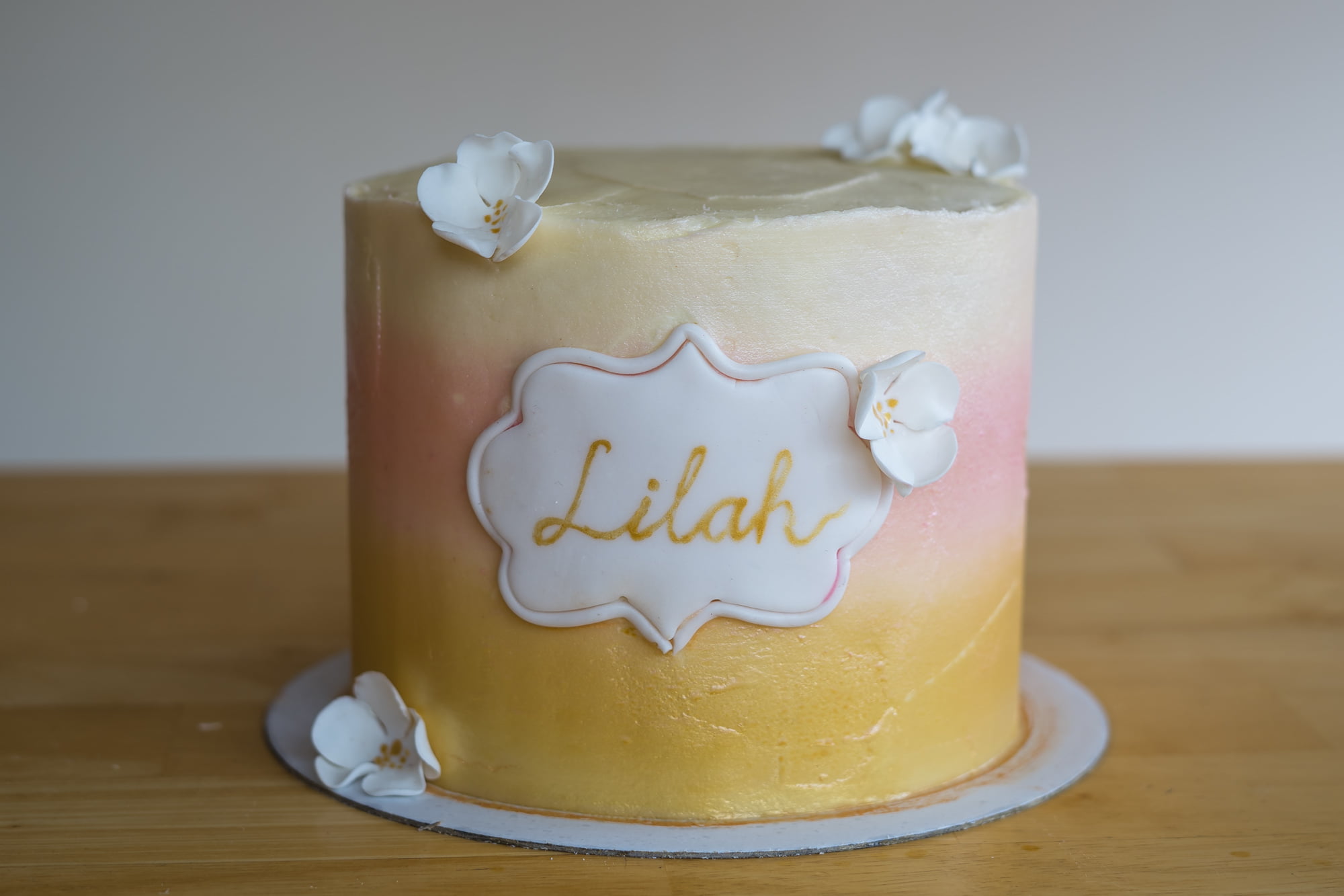 Pastel gold and pink childs cake