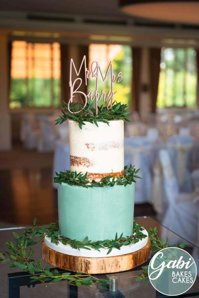 Two tier green white wedding cake