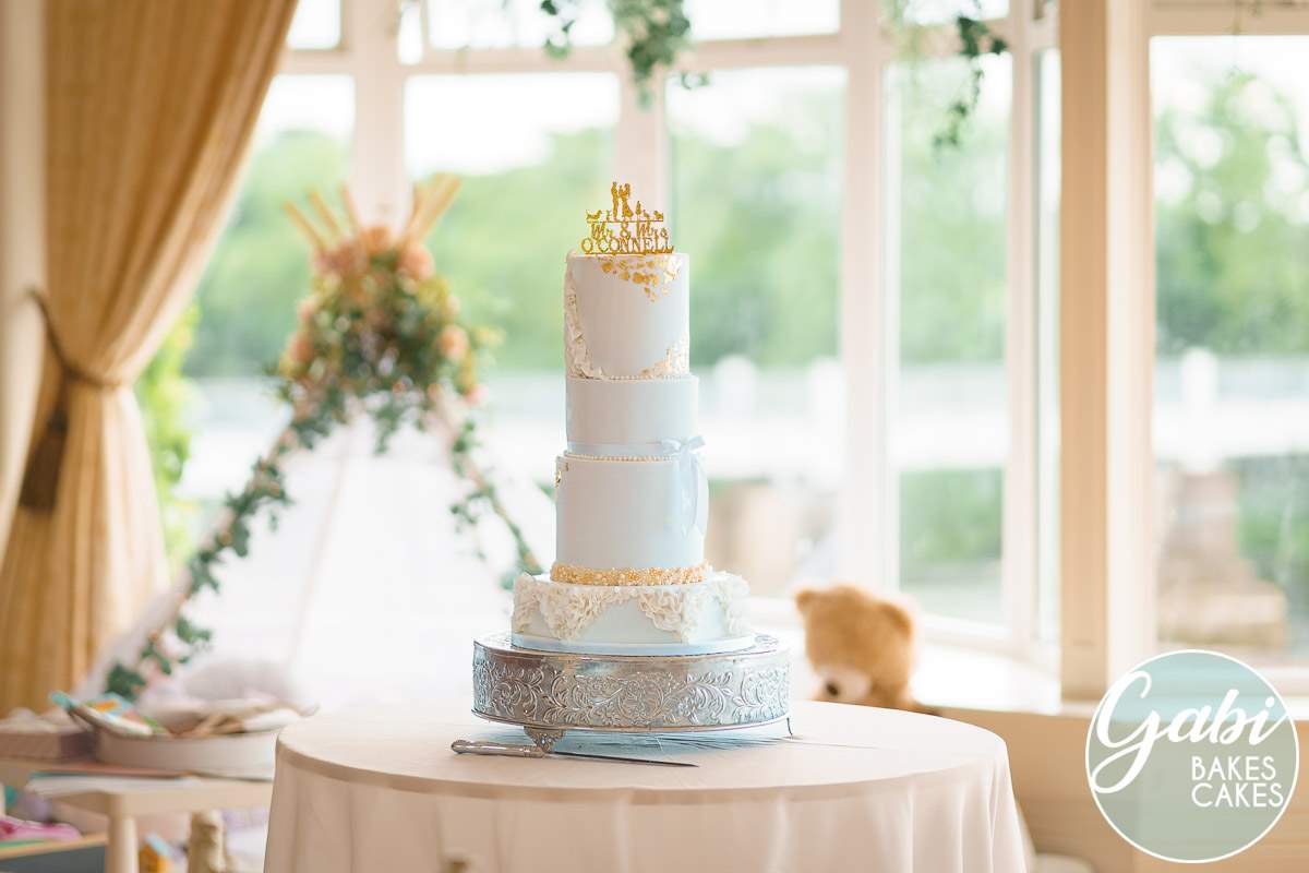 4 tier white gold wedding cake