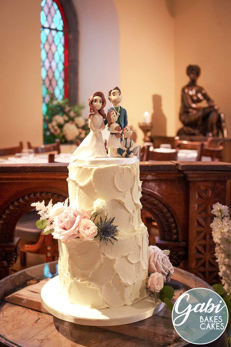 Family topper wedding cake.