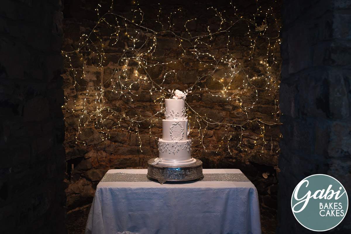 Three tier classic white wedding cake.